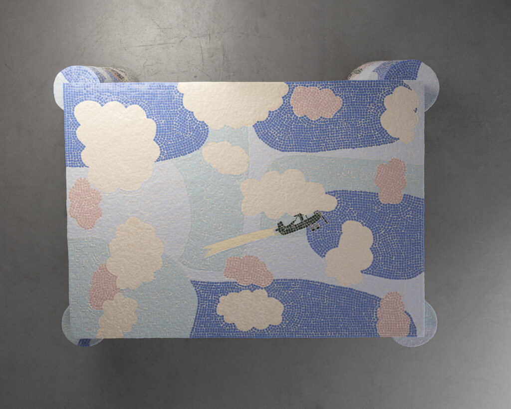 Overhead view of a mosaic tabletop illustrating a whimsical sky with drifting clouds, soft pastel light, and a tiny airplane gliding through.