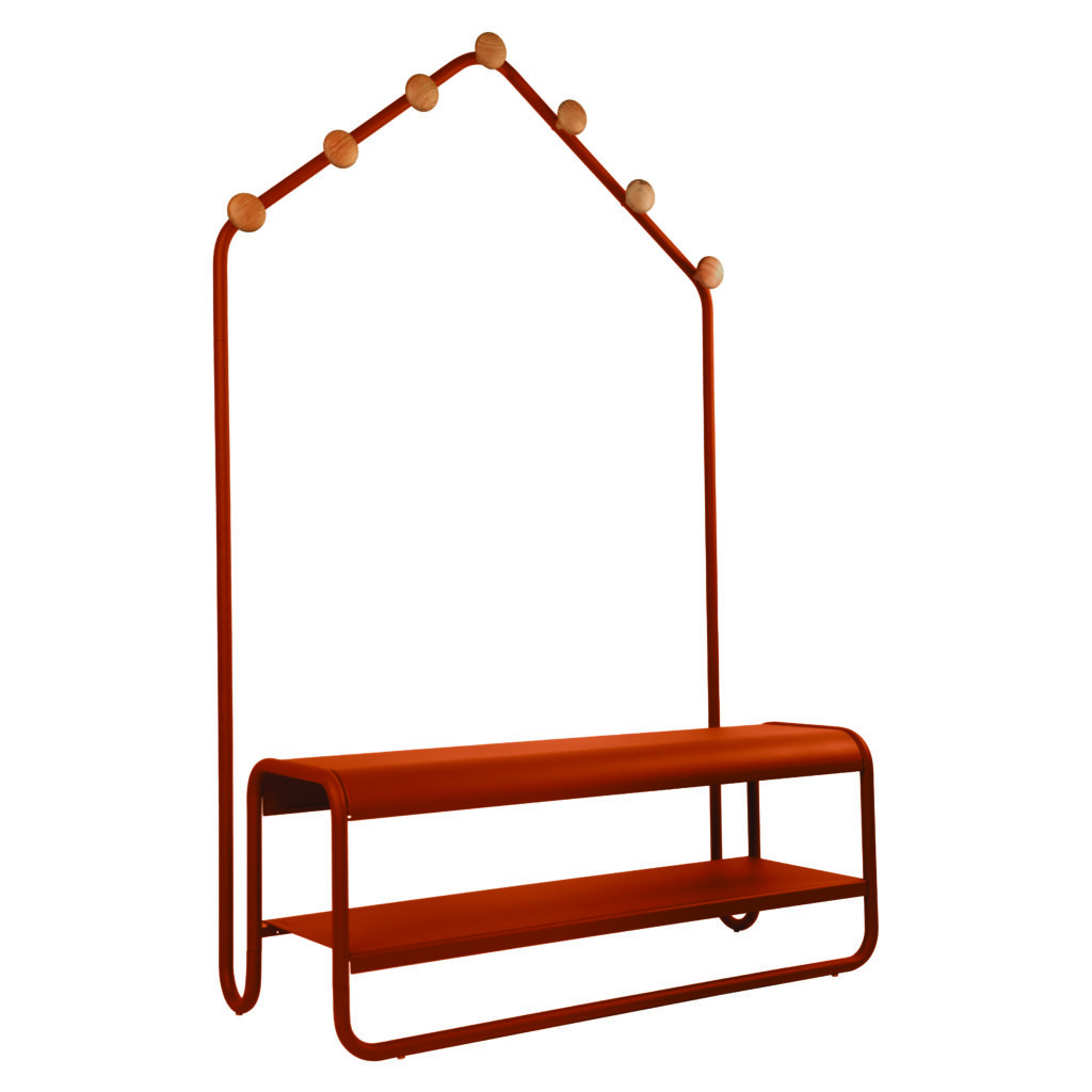 The Funambule Cloakroom Bench in bright orange, with a slim house-shaped frame, oversized wooden pegs, and a two-tier bench for shoes or storage.
