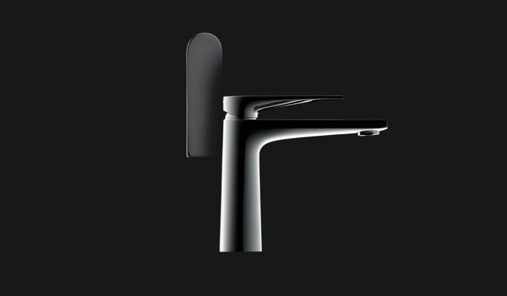 A close-up of Duravit’s Tulum faucet by Philippe Starck in matte black, spotlighted against a dark backdrop—sleek, sculptural, and designed for performance.