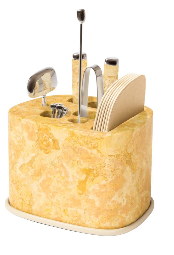 Giallo Reale marble bar accessories set with integrated cast-bronze tools, merging stone and metal into a cohesive luxury bar accessories ensemble.