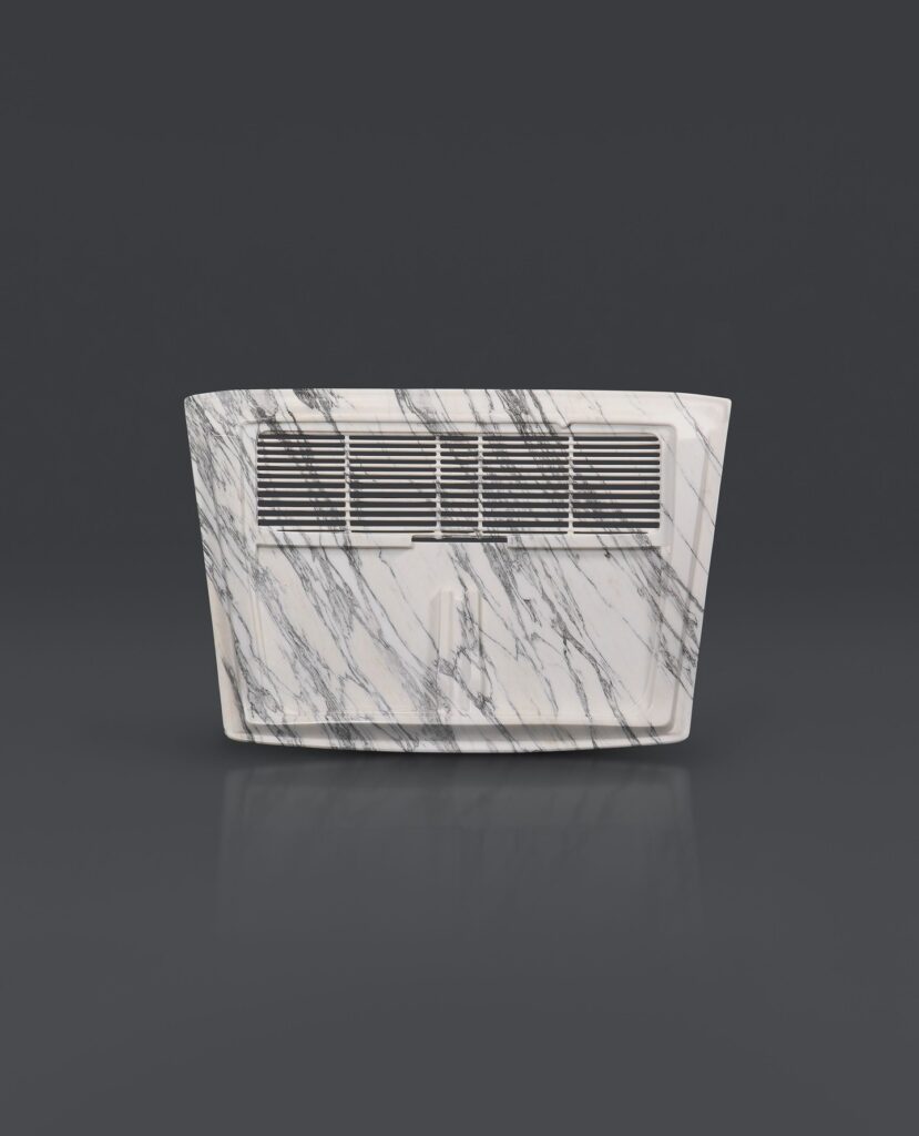 Automotive panel carved from marble, reducing a functional car component to a quiet architectural surface.