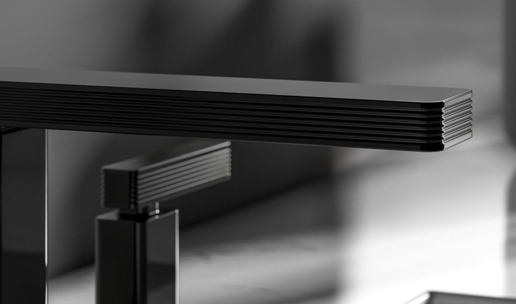 Overhead view of Zephyr widespread faucets and levers in Polished Black PVD, their faceted forms and precise spacing emphasizing architectural bathroom fixtures designed for clarity and durability.