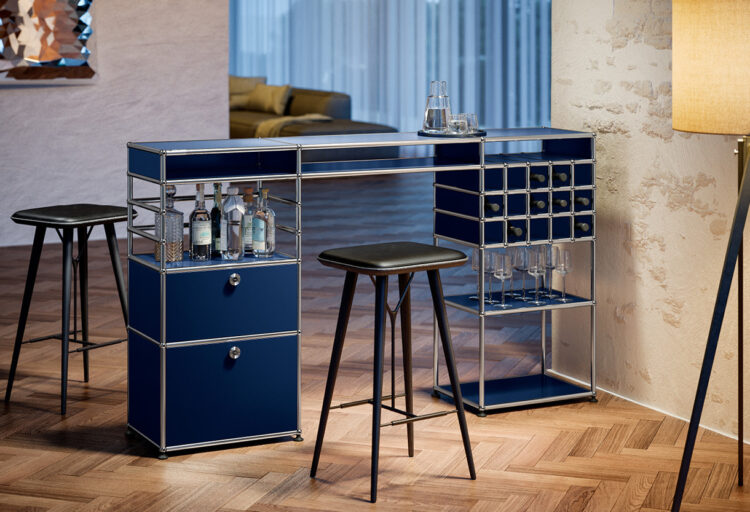 Expanded USM modular bar console with integrated wine grid and shelving, illustrating a larger-scale modular bar cart design for hospitality settings.