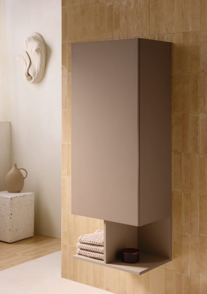 Tall fluted storage cabinet from Duravit’s Balcoon collection adds vertical rhythm to an architectural bathroom design.
