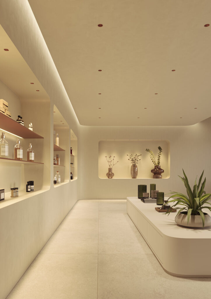Warm-toned retail interior with integrated recessed ceiling lights, softly illuminating shelving and display niches—low-glare commercial lighting solution