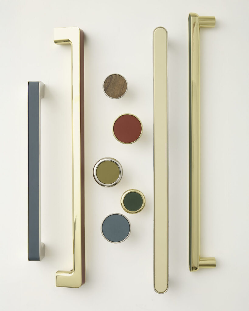 Vestige custom cabinet hardware collection showing brass cabinet pulls and knobs with interchangeable painted and wood insert options.