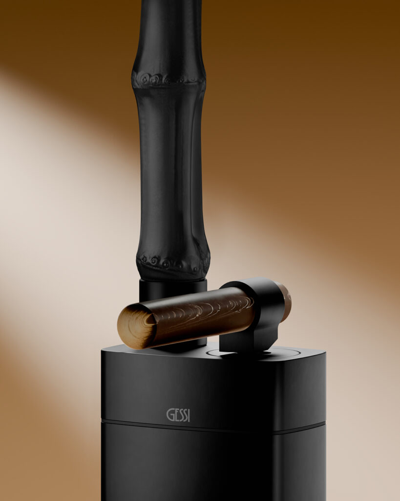 Detail of the Gessi Jacqueline luxury bathroom fixtures faucet with black bamboo spout, brass control, and matte black base.