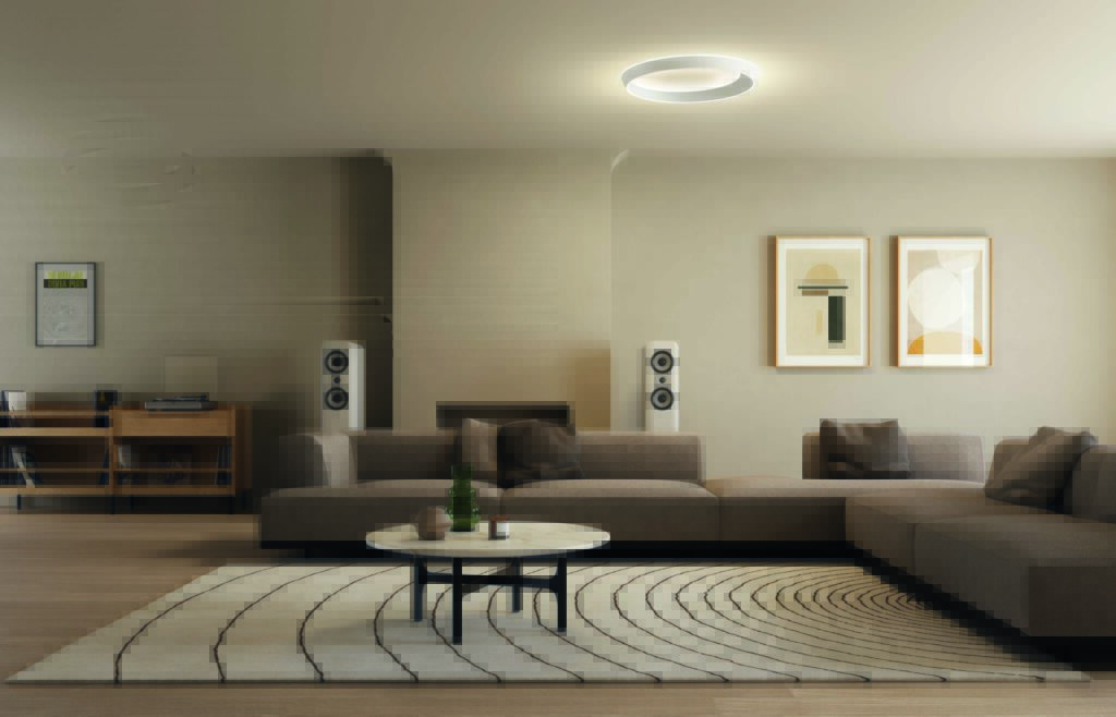 Modern ceiling lighting from the Lodes Tidal Collection with a sculptural flush-mount ring illuminating a contemporary living room.