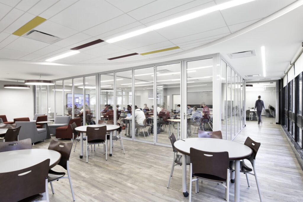 NanaWall NW Acoustical 645 folding glass walls enclosing a classroom while maintaining clear sightlines