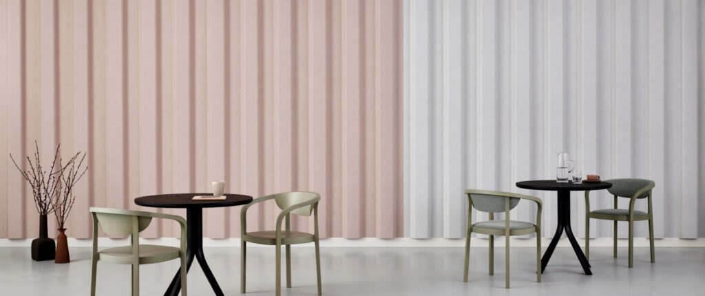 Kirei Column acoustic wall panels in blush and white with deep floor-to-ceiling vertical fluting