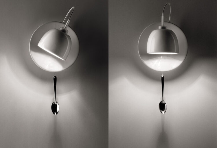 Light Au Lait wall light by Ingo Maurer with a white cup, saucer, and hanging spoon