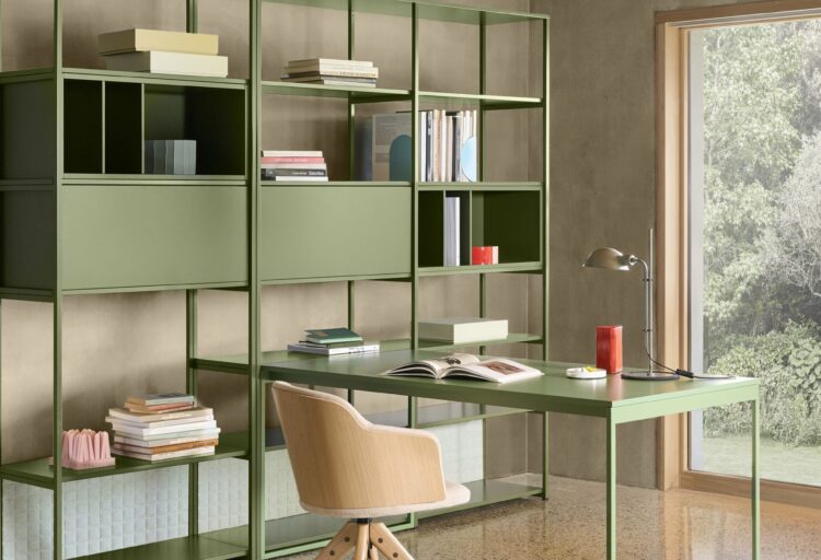 Dieffebi Line System modular shelving system in green with an integrated desk, closed cabinets, and pale quilted lower panels.